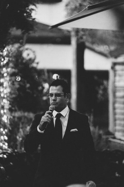 Black-tie evening — Shaun on the microphone